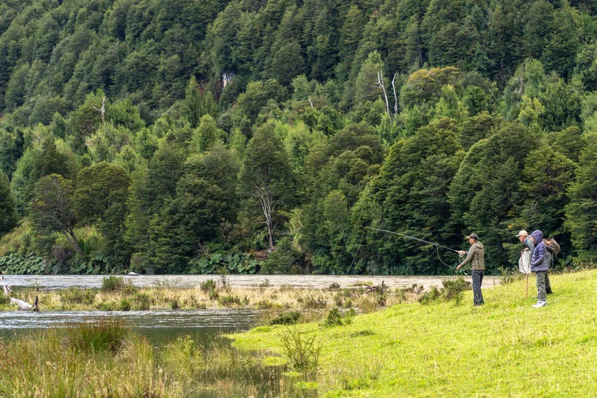 Robert Konishi casts to risers on the spring creek with wife Jeanine and guide Andy Manstein shortly after arriving at River of Dreams Basecamp.