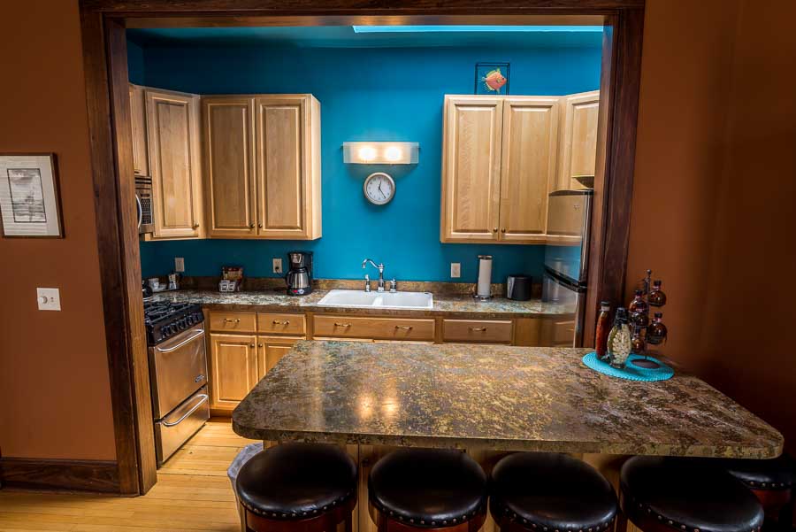 Stylish turquoise kitchen renovated by Parlour Farm